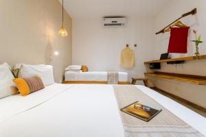 プレアにあるCasa PESQUEIRA Preá - Frente Mar!のホテルルーム(財布付きのベッド付) +75枚の写真