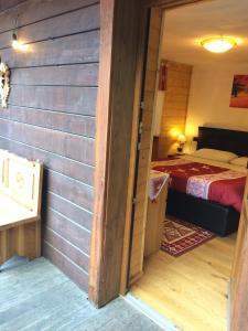Postel nebo postele na pokoji v ubytování B&B Gressoney