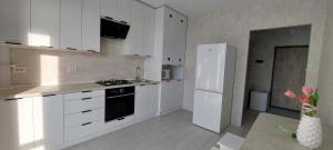 Köök või kööginurk majutusasutuses DreamTown Однокімнатна біля вокзалу