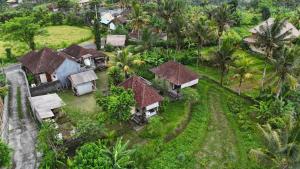 an aerial view of a house in a forest at Maha Neka Villa in Sidemen