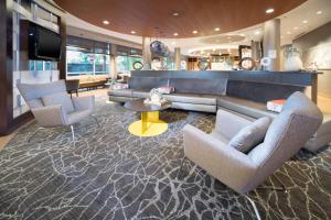 a lobby with two chairs and a couch and a table at SpringHill Suites by Marriott Philadelphia Valley Forge/King of Prussia in King of Prussia