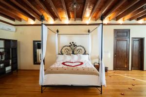 Postel nebo postele na pokoji v ubytování Casalinda San Miguel