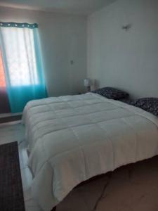 Una cama o camas en una habitación de Panoramic Paradise