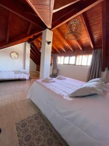 Voodi või voodid majutusasutuse Casa Estivariz Madryn toas