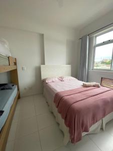 Postel nebo postele na pokoji v ubytování Lindo Apto 2 quartos com suíte na quadra da prainha! + 27 fotografií