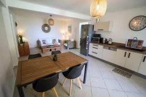 A kitchen or kitchenette at Belle vue de Grande Anse