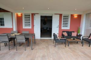 A patio or other outdoor area at Belle vue de Grande Anse