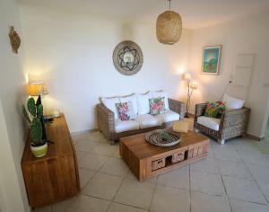 A seating area at Belle vue de Grande Anse