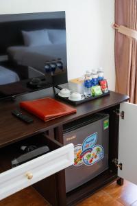TV a/nebo společenská místnost v ubytování BIDV Central Da Lat Hotel