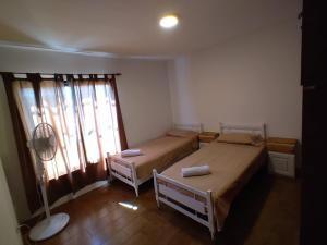 Fotografie z fotogalerie ubytování Cálida Casa - 2 Hab - centro MG -15 min Ezeiza v destinaci Monte Grande + 4 fotografie