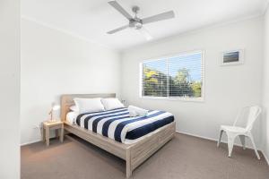 Ένα ή περισσότερα κρεβάτια σε δωμάτιο στο Generous Family Home with 4 Bedrooms, Pool, Pet Friendly +20 φωτογραφίες