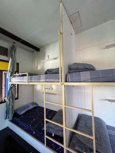 Postel nebo postele na pokoji v ubytování Baan Chiang Maan