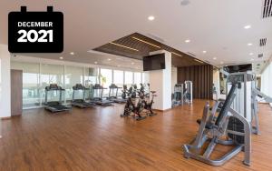 a gym with cardio equipment in a building at ENCANTAME TOWERS VIENTO 203 in Playa Encanto