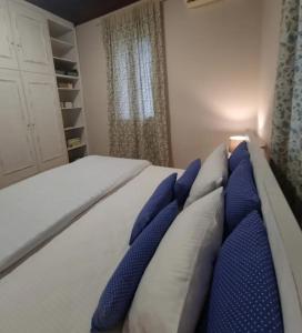 Кровать или кровати в номере Casa Arokaria