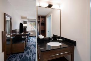 a bathroom with a sink and a large mirror at Fairfield Inn by Marriott Amesbury in Amesbury +31 photos