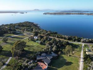 an aerial view of an island in the water at Faraway on Flinders Island 