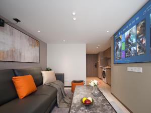 Χώρος καθιστικού στο East Maple Hotel Apartment - Guangzhou Financial City Sanxi Metro Station