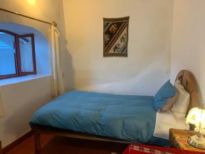 Hospedaje Killipata客房内的一张或多张床位