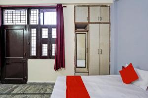Postel nebo postele na pokoji v ubytování Super Hotel O KHANNA'S HOTEL