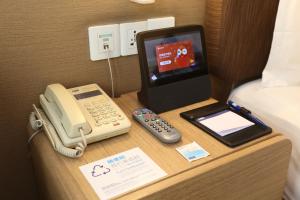 TV/Unterhaltungsangebot in der Unterkunft Holiday Inn Express Shanghai Jinsha by IHG