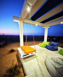 Posezení v ubytování SAMA Al Areesh Desert Camp