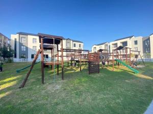 Zona de joacă pentru copii de la Peaceful and Luxurious Apartment