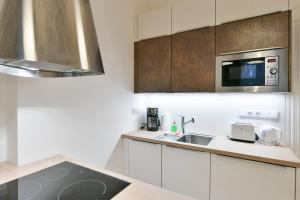 Kuchyň nebo kuchyňský kout v ubytování Kubelíkova 32 Residence