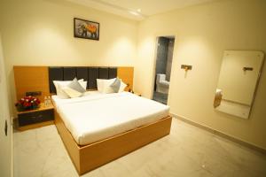 Foto sihtkohas Mysore asuva majutusasutuse Emerald Urban Comforts galeriist