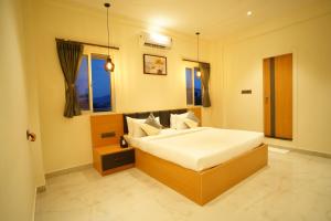 Foto sihtkohas Mysore asuva majutusasutuse Emerald Urban Comforts galeriist