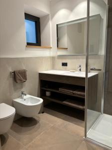 Kúpeľňa v ubytovaní Appartements Pedescin
