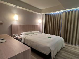 Katil atau katil-katil dalam bilik di 台北馥華商旅 松江館