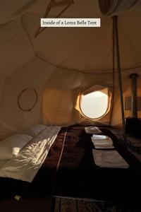 a small tent with a small window in it at Glamping Tago in Khulo