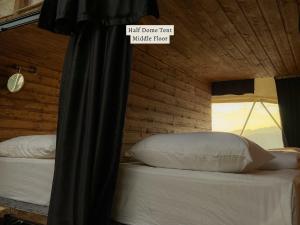 Letto o letti in una camera di Glamping Tago