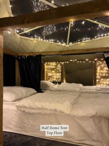 Letto o letti in una camera di Glamping Tago