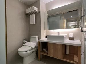 Bilik mandi di 台北馥華商旅 松江館