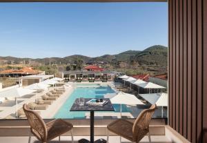 a view of the pool on the roof of a hotel at Oniro Boutique Hotel in Toroni