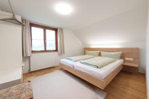 Voodi või voodid majutusasutuse Ferienwohnung Raid toas
