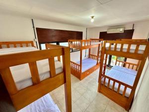 Postel nebo postele na pokoji v ubytování Rodin Bali Hostel