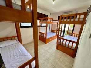 Postel nebo postele na pokoji v ubytování Rodin Bali Hostel