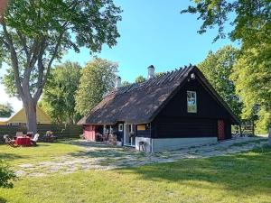 Un jardín fuera de Romantiline talu ja saun Muhumaa südames