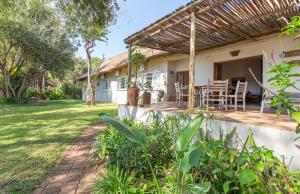 an image of a house with a patio at Drift Inn in Victoria Falls