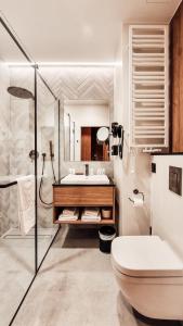 Koupelna v ubytování Fabryka Wełny Hotel & Spa
