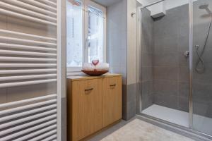 Bilik mandi di DolomiApartments - Appartamento Avisio +18 gambar