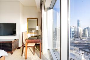 TV a/nebo společenská místnost v ubytování Address Dubai Marina - 1B Apartment, Marina View with 5 Star Facilities by Gardenia Suites