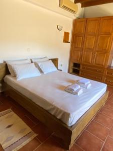 A bed or beds in a room at To Palio