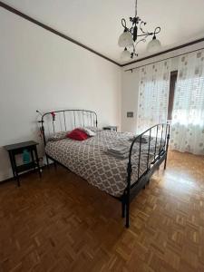 Postel nebo postele na pokoji v ubytování Appartamento alle porte d'Ivrea