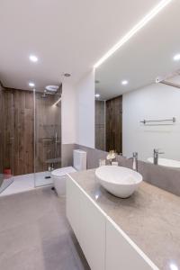 Et badeværelse på Compromisso 25 + 26 billeder