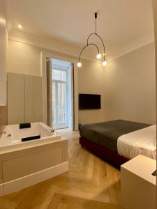 A bed or beds in a room at Relais Della Porta