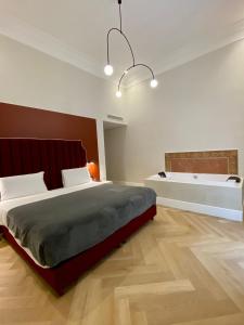 A bed or beds in a room at Relais Della Porta