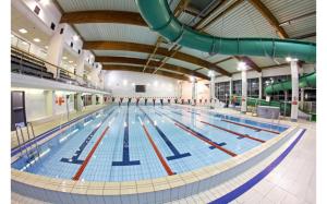 a large swimming pool with lanes in it at OSiR Polna in Warsaw